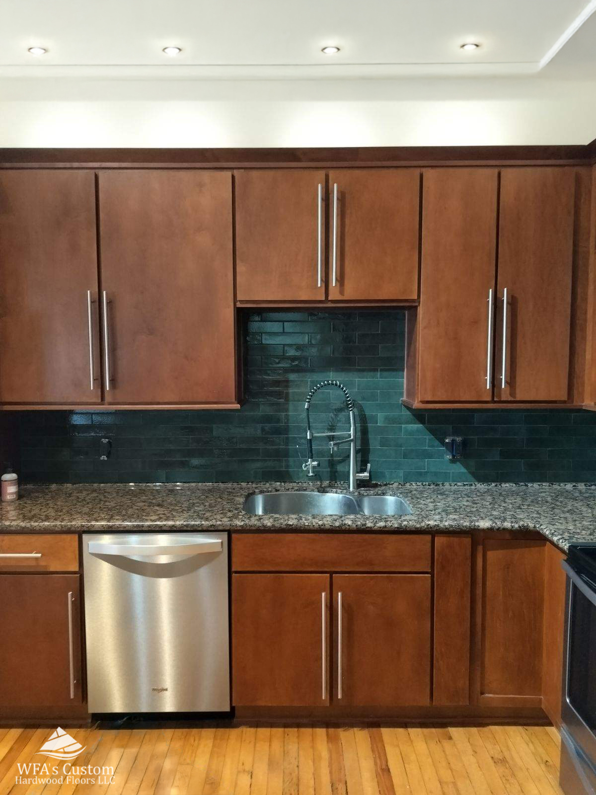 sea green backsplash installation in kitchen, wfa's custom hardwood floors, houston texas